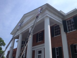 Painters ascending the north portico. 